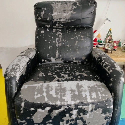 Reclining armchair refurbished leather with damage
