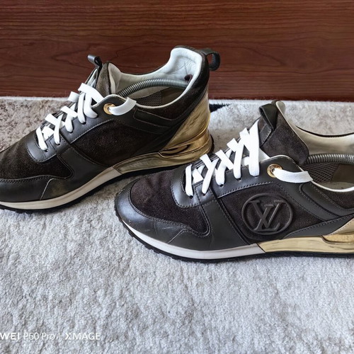 Louis Vuitton sneakers used size 38.5 with visible wear
