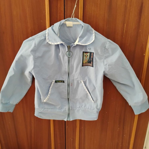 Kindergarten shirt from 1982 used with minor stains and small tear