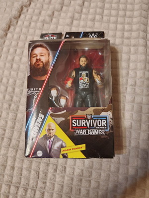 WWE Elite Collection Survivor Series 2024 Kevin Owens екшън фигура, Mattel, Adam Pearce BAF