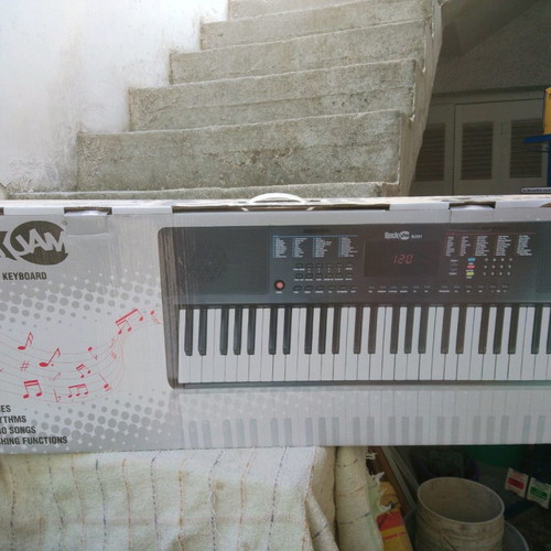 Electronic piano new, in original box, without manual