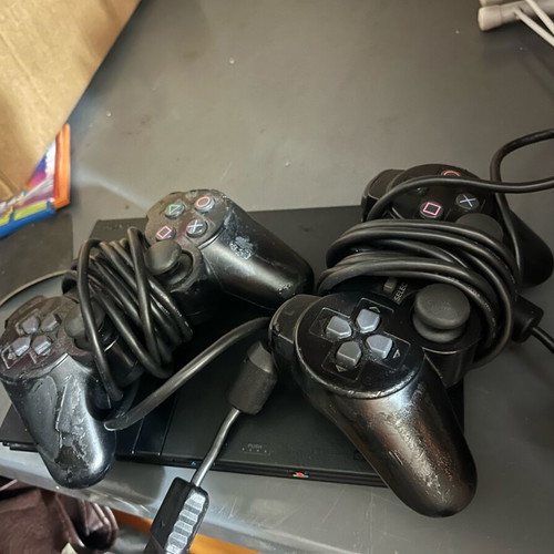 Sony PlayStation 2 used, scratched controllers, excellent box