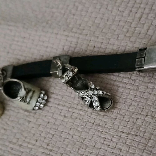 Rubber bracelet with charms like new
