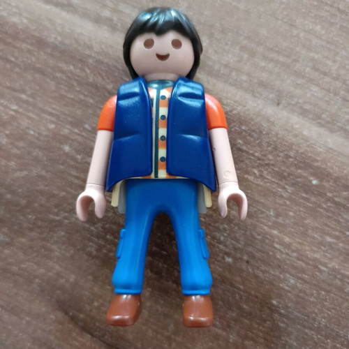 Playmobil figure with vest like new