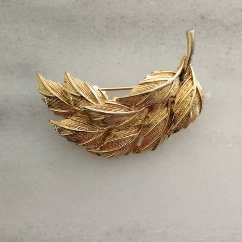 Pin used, old, gold-colored