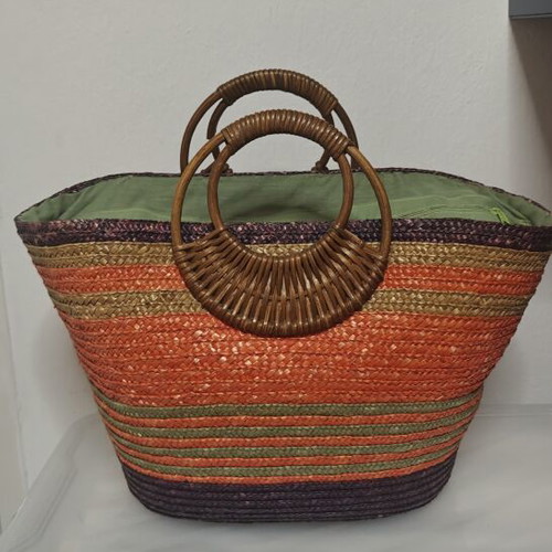 Straw beach bag with wooden handles used, multicolor