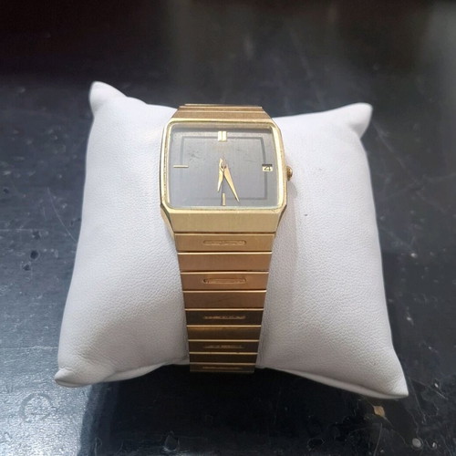 Seiko Quartz 6532-5260 vintage unisex watch black dial gold bracelet used