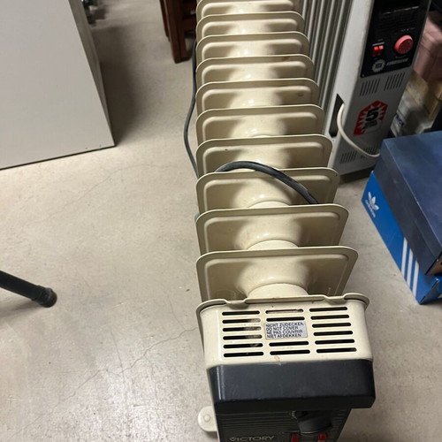 Oil radiator used, 2 pieces with 11 and 12 fins