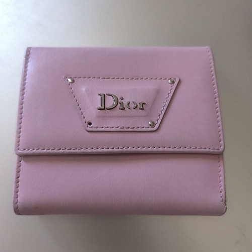 Dior wallet used, pink with slight wear and missing stud