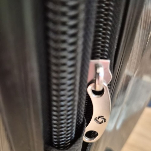 Samsonite hard suitcase used with TSA lock and 4 wheels