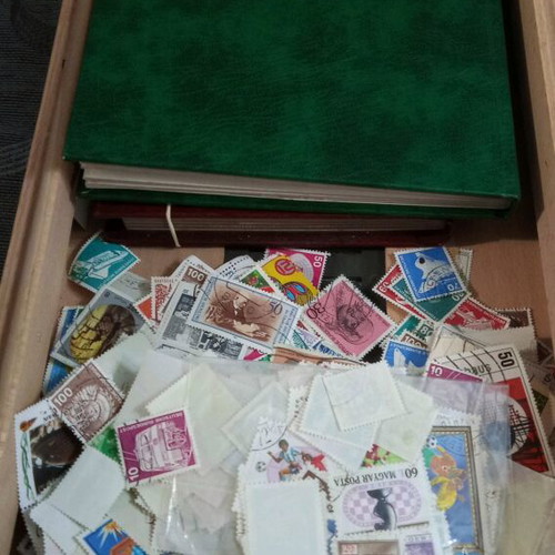 Stamps like new, collectible with two albums in storage box