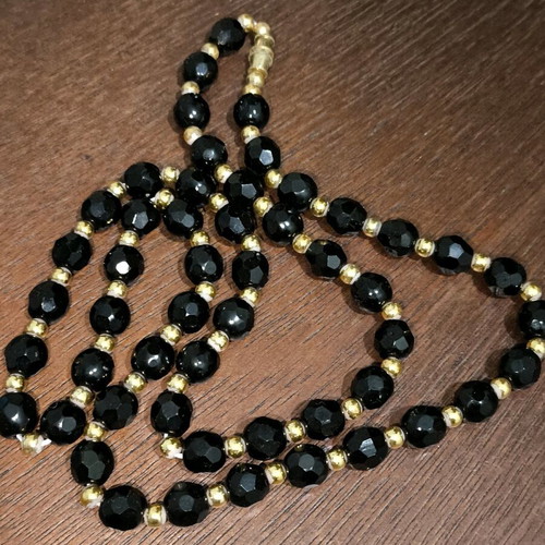 Vintage Monet necklace like new with black and gold beads