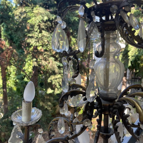 Antique chandelier used with bronze and crystal