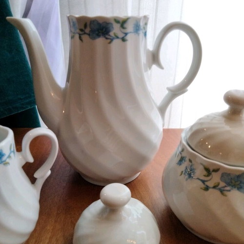 Vintage tea and coffee set in white porcelain like new