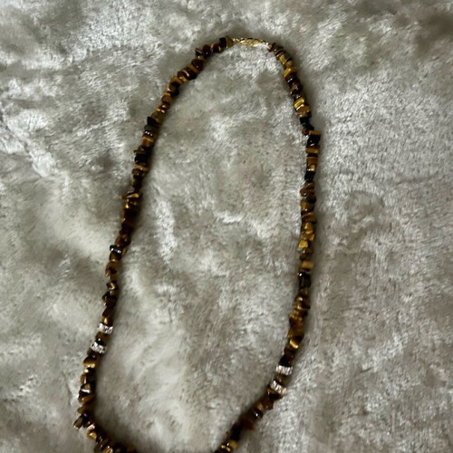 Necklace brown with asymmetric beads like new
