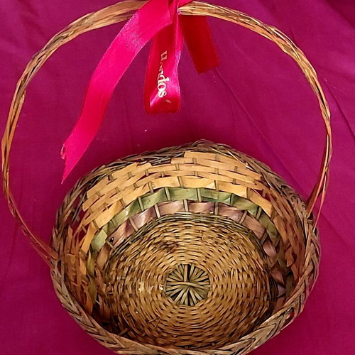 Wicker Easter basket used with red ribbon