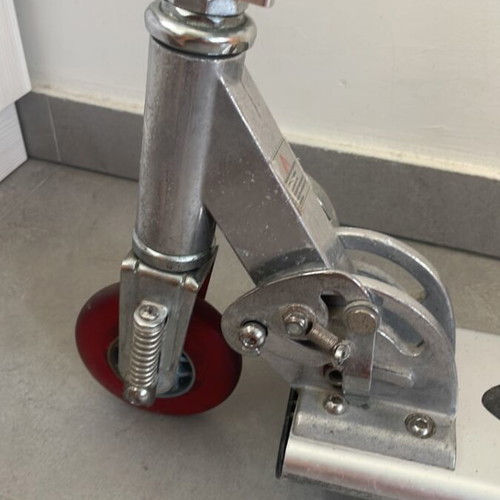 Scooter used with adjustable handlebar height and rear wheel brake
