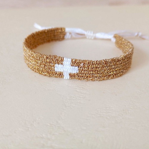 Woven bracelet with metallic gold cross new, white cotton thread