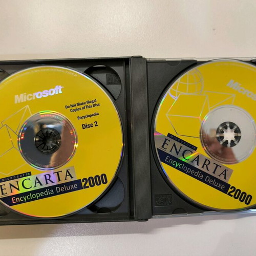 Microsoft Encarta Encyclopedia Deluxe 2000 like new, complete 3 CD set with manual