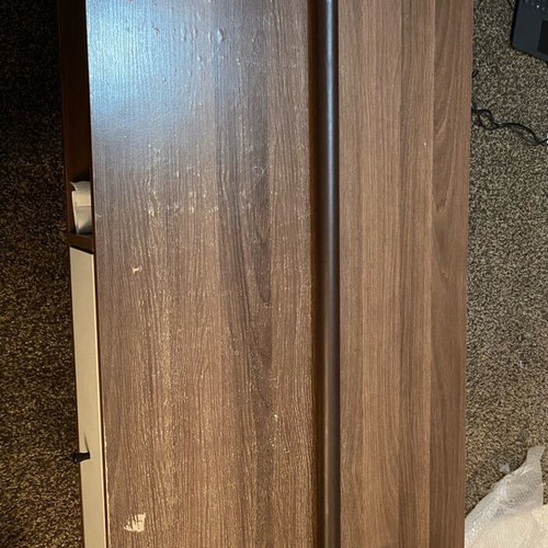 Wall hanger with leather covering brown like new