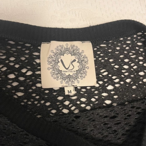 Black perforated blouse like new, medium size, loose fit