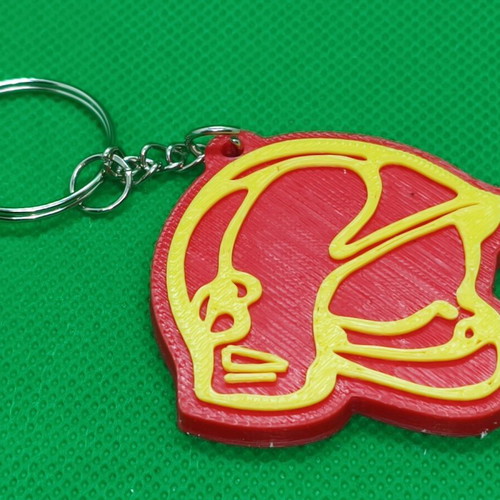Fire helmet keychain like new with two-color print