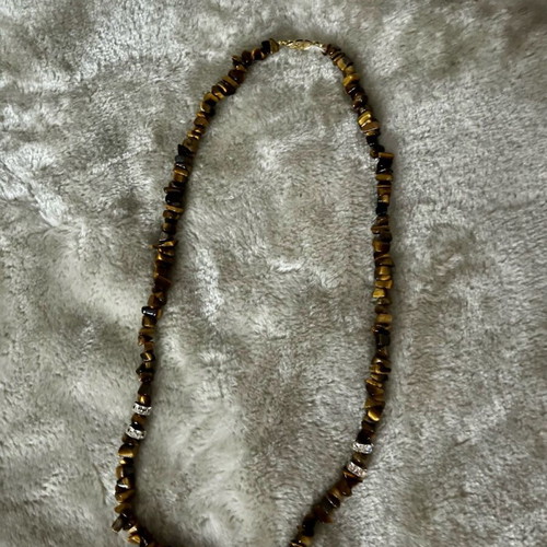 Necklace brown with asymmetric beads like new