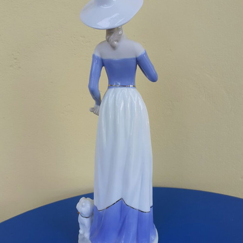 Vintage figurine of aristocratic lady with dog porcelain like new