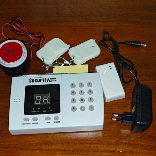 Home Security wireless alarm system like new with remote controls and siren