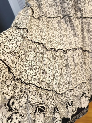 Cotton dress with ruffles, black trims, zipper waist