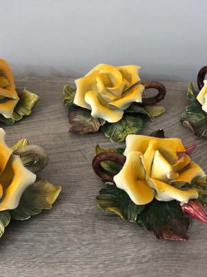 Vintage porcelain candle holders five pieces in good condition