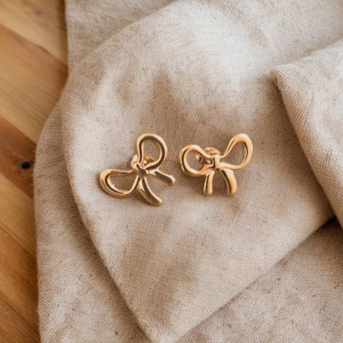 Steel bow earrings new, gold plated