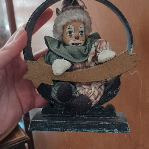 Decorative clown doll in frame like new
