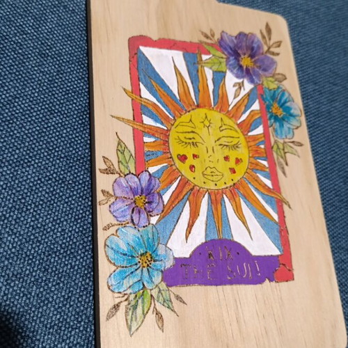 Pyrography and painting on cutting board like new