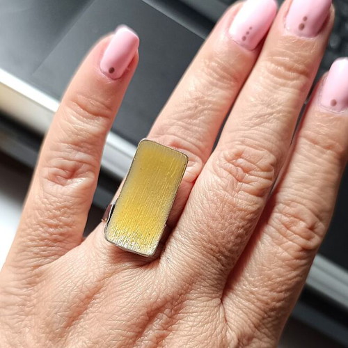 Ring with enamel in yellow and silver tones, new