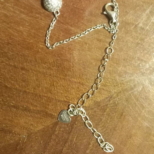 Silver bracelet with stones and infinity symbol like new