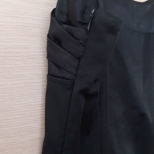 Mini black dress like new, size M, with side zipper and ruffles
