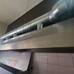 Extractor hood used with table