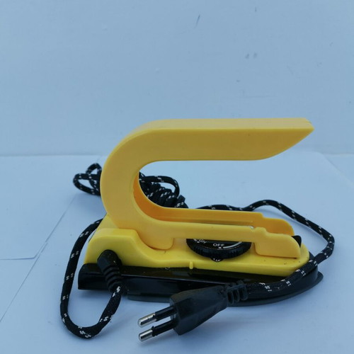 Travel iron used, year 2000
