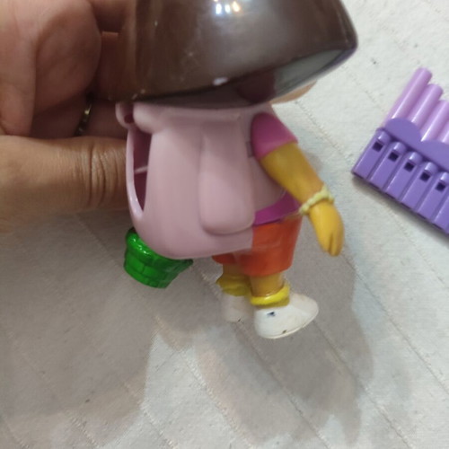 Dora the Explorer figures used, including backpack and magic flute