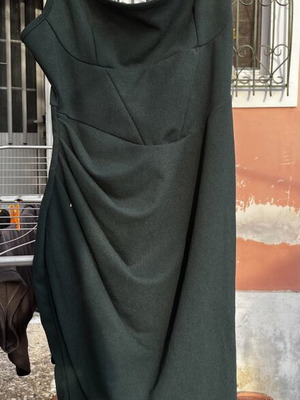 Dress green, like new, adjustable straps, side slit