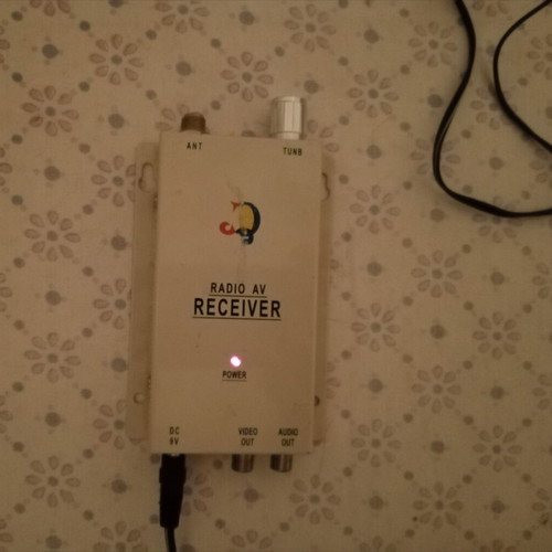 Wireless audio and video receiver with power supply
