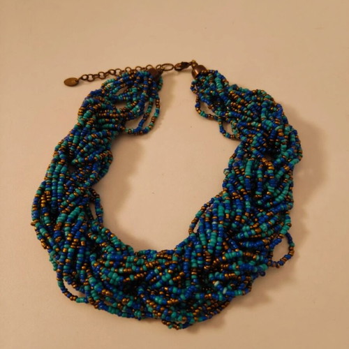 Statement necklace like new with blue and gold braided seed beads