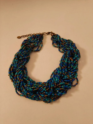 Statement necklace like new with blue and gold braided seed beads