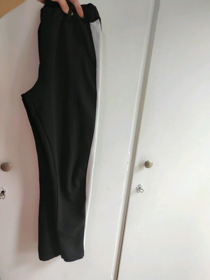Women's leggings small with pockets and white stripe on side
