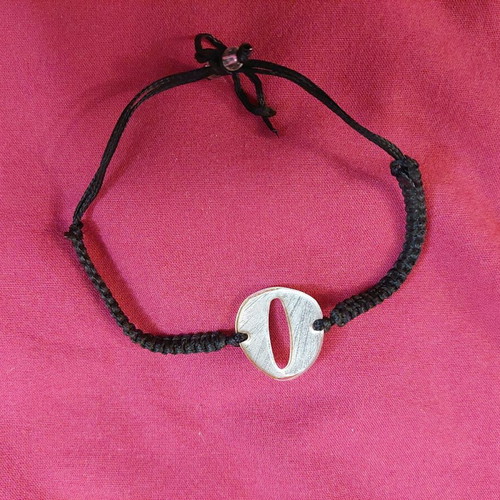 Bracelet with letter O used, black and gold adjustable cord