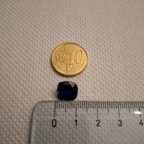 Artificial sapphire like new, dark blue, approx. 1cm x 1cm