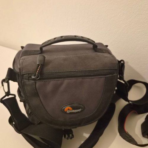Canon EOS 450D camera used with 17-85mm zoom lens and accessories