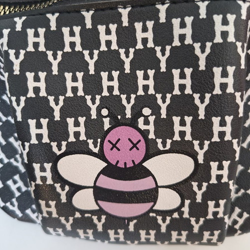 Children's waist bag like new, black with bee print