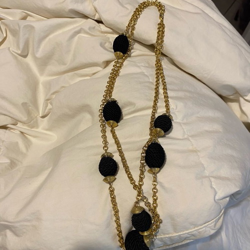 Double long necklace like new, gold tone with black knots